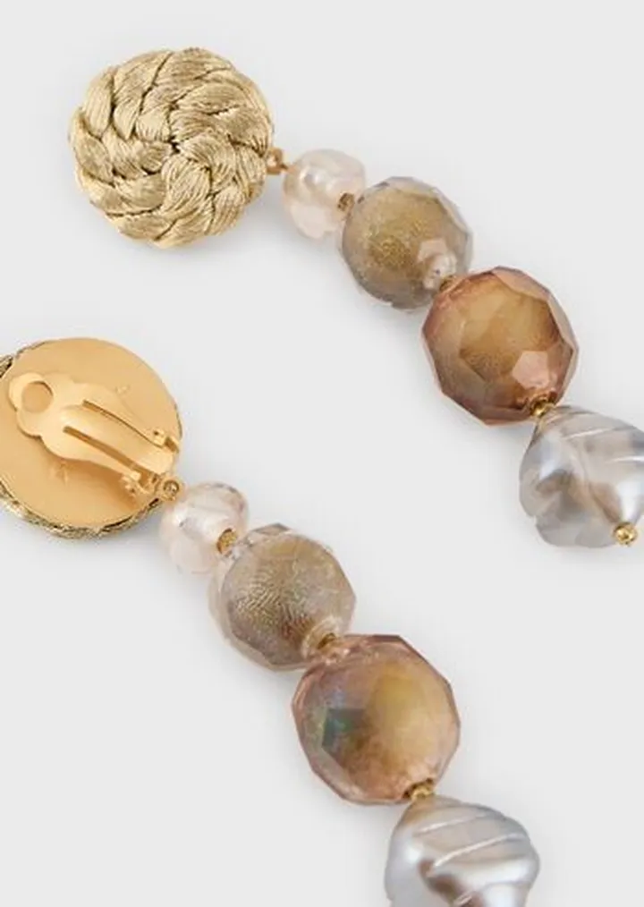 Clip-on earrings with multi-faceted pendants and spheres