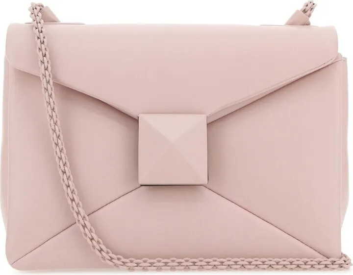 Rose quartz Light Pink Nappa Leather One Stud Shoulder Bag from Valentino Garavani Shoulder bag realized in lamb nappa leather enriched by maxi metal stud at the front.