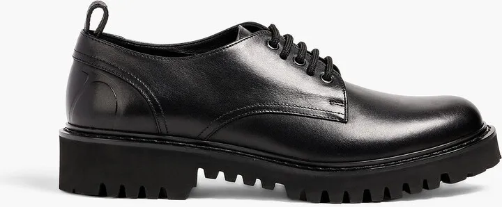 Logo-embossed leather brogues