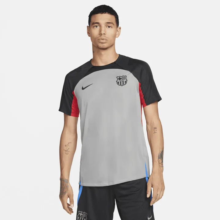 FC Barcelona Strike Nike Men's Dri-FIT Short-Sleeve Soccer Top in Grey