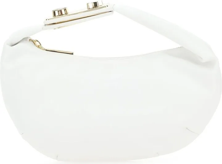 Handbag realized in synthetic leather enriched by Eye Star Lock detail on the handle.