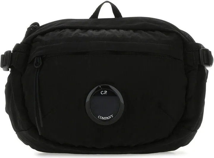 Belt bag realized in nylon enriched by logoed metal detail at the front.