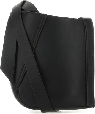 Crossbody bag realized in smooth calf leather characterized by embossed logo at the front.