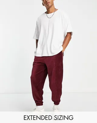 ASOS DESIGN oversized sweatpants in burgundy ribbed velour