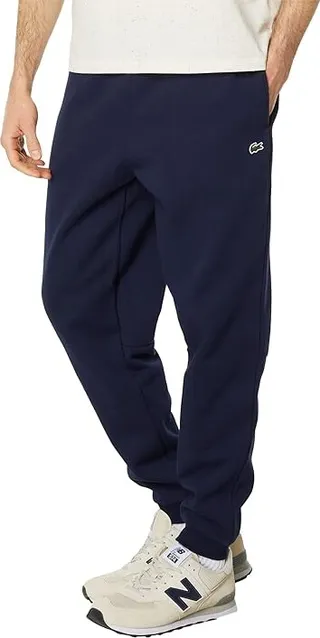 Lacoste Essentials Fleece Sweatpants with Ribbed Ankle Opening (Navy Blue) Men's Clothing