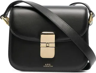 Shoulder bag made of smooth cowhide featuring a contrasting logo printed on the front.