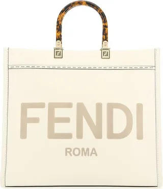 Shopping bag realized in smooth King calf leather characterized by embossed logo at the front.