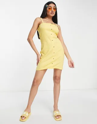 ASOS DESIGN mini button up ribbed dress with frill hem in yellow