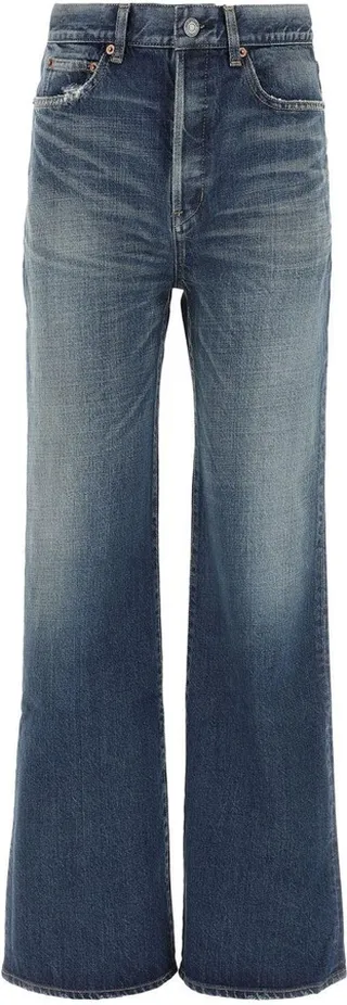 High waist jeans realized in stonewashed and sightly distressed pure cotton denim enriched by leather logoed label at the back.