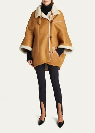 Oversized Leather Cape with Shearling Lining