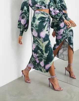 ASOS EDITION satin knot front midi skirt with split in blurred floral print
