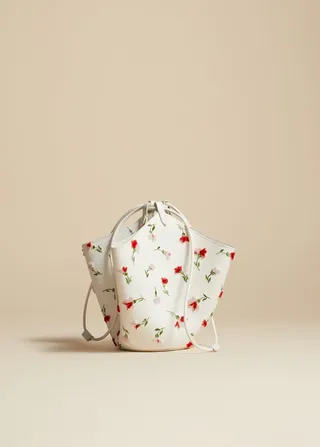 The Mini Lotus Drawstring Bag in White Leather with Floral Embroidery