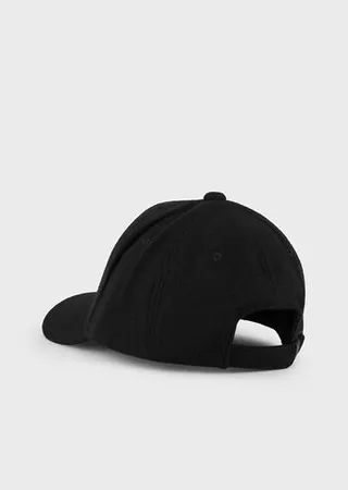 Baseball cap with embossed embroidered lettering