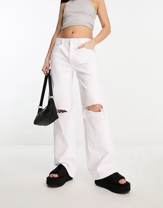 ASOS DESIGN baggy boyfriend jeans in white with knee rips