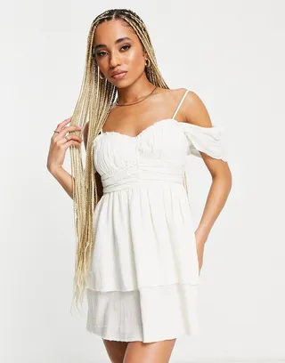 ASOS DESIGN crinkle raw edge double layer skater mini sundress in cream