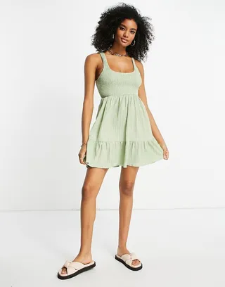 ASOS DESIGN shirred mini sundress with tiers in stripe texture in sage