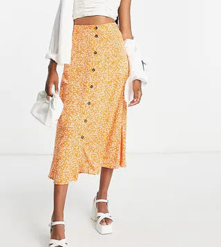 ASOS DESIGN Tall button through pocket midi skirt in orange ditsy floral