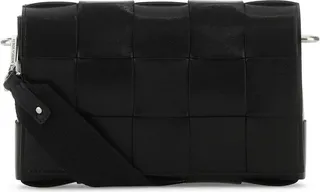 Crossbody bag realized in smooth calf leather characterized by iconic Intrecciato motif on the entire surface.