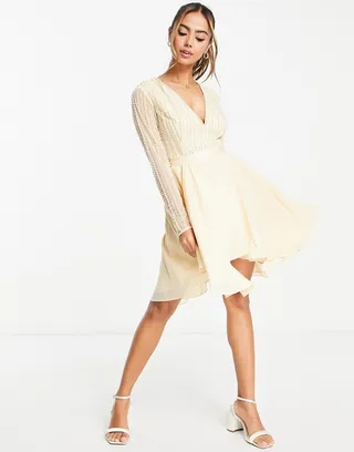 ASOS DESIGN linear embellished bodice mini dress with wrap skirt in cream