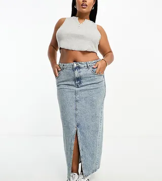 ASOS DESIGN Curve denim midi skirt with split hem in midwash