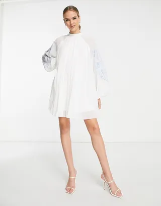 ASOS DESIGN pleated babydoll mini dress with oversized cutwork sleeve in white