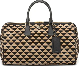 Symbole embroidered fabric travel bag