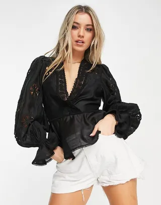 ASOS DESIGN lace trim v neck blouse with volume sleeve & cutwork in black