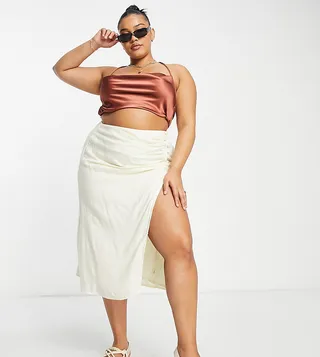 ASOS DESIGN Curve drapey button side thigh split midi skirt in cream