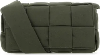 Crossbody bag realized in fabric characterized by iconic Intrecciato motif on the entire surface.