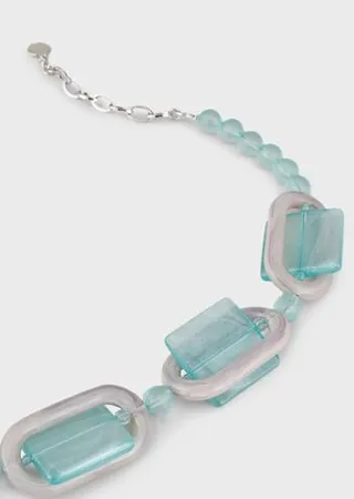 Necklace with plexiglass spheres and geometric details