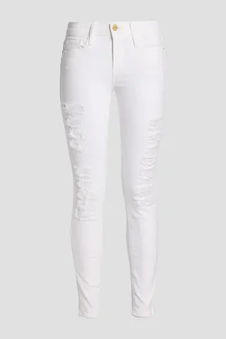 Distressed mid-rise skinny jeans