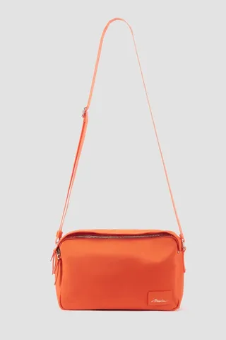 The Deconstructed Camera Bag in orange