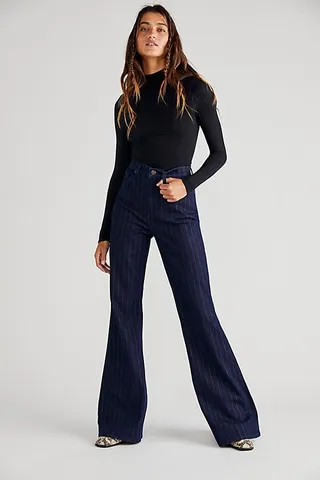 Lee High-Rise Flare Jeans by Lee at Free People