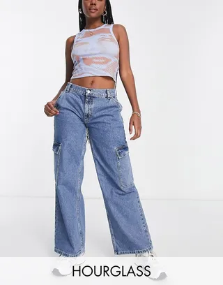 ASOS DESIGN Hourglass cotton blend low rise 'cargo' jean in mid wash blue - LBLUE