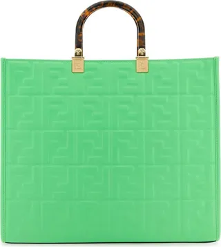 Shopping bag realized in King calf leather characterized by FF motif in relief on the entire surface.