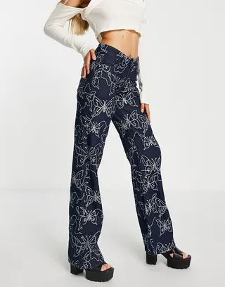 Jaded London low rise boyfriend fit denim jeans in embossed butterfly