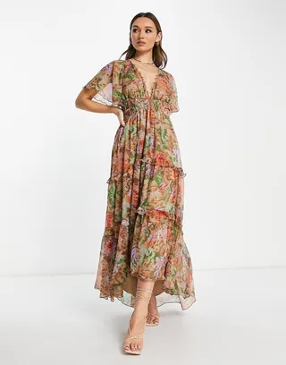 ASOS DESIGN angel sleeve plunge tiered maxi dress with cut out and rouleaux detail in blurred floral print