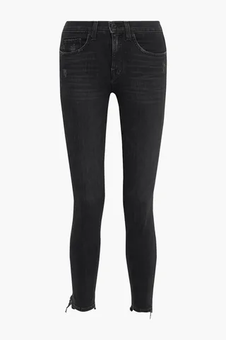 Distressed mid-rise skinny jeans