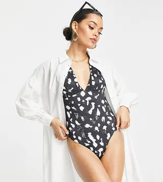 ASOS DESIGN Petite gathered plunge swimsuit in mono spot print