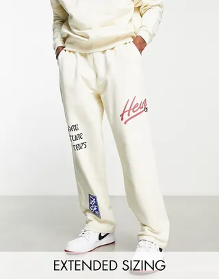ASOS Dark Future relaxed fixed hem sweatpants with multi graphic prints in ecru - part of a set