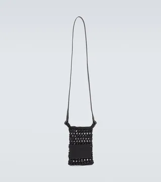 Leather-trimmed crochet crossbody bag
