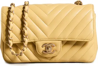 What Goes Around Comes Around Chanel Yellow Half Flap Mini Bag