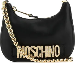 Handbag realized in slightly pebble leather enriched by metal lettering logo at the front.