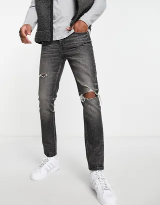 ASOS DESIGN Cone Mill Denim skinny fit 'American classic' jeans in washed black with knee rip