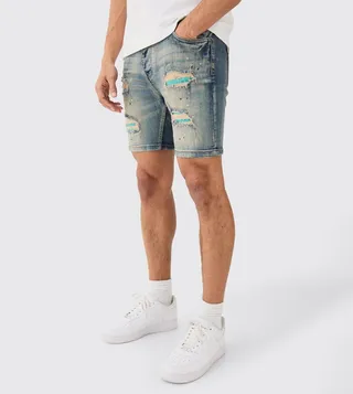 Ripped Mid Rise Denim Shorts