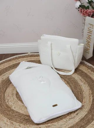 Newborn meds with portable diaper storage bag 