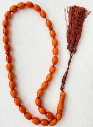 red orange prayer beads 