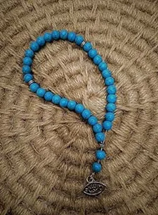 Stone rosary 33 pieces turquoise with a silver religious pendant 