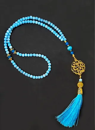 Cat's eye stone rosary with a pendant 