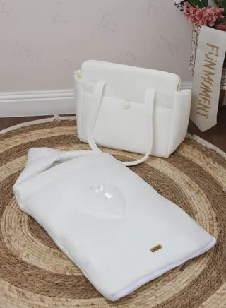 Newborn meds with portable diaper storage bag 